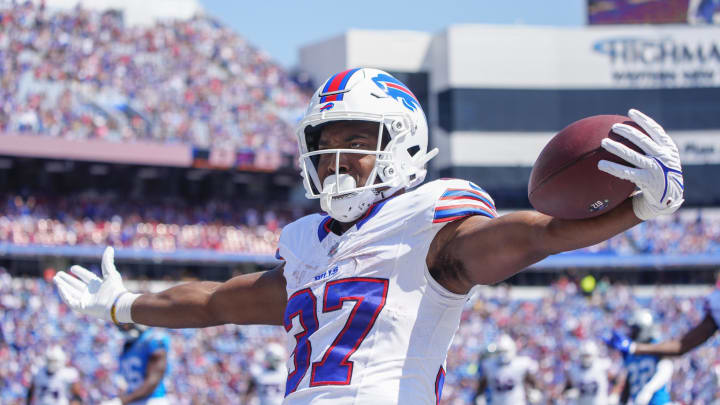 Aug 24, 2024; Orchard Park, NY; Buffalo Bills running back Darrynton Evans (37) reacts to scoring a touchdown against the Carolina Panthers during the first half at Highmark Stadium. 