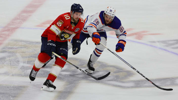 Jun 8, 2024; Sunrise, Florida, USA; Edmonton Oilers defenseman Philip Broberg (86) defends against Florida Panthers forward Vladimir Tarasenko (10) during the second period in game one of the 2024 Stanley Cup Final at Amerant Bank Arena. Mandatory Credit: Sam Navarro-USA TODAY Sports