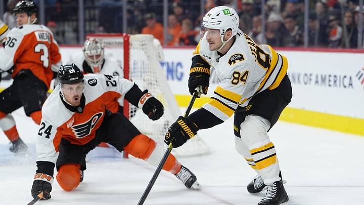 Apr 5, 2026; Philadelphia, Pennsylvania, USA; Boston Bruins left wing Tanner Jeannot (84) passes the puck against Philadelphia Flyers defenseman Nick Seeler (24) in the second period at Xfinity Mobile Arena. Mandatory Credit: Kyle Ross-Imagn Images Apr 5, 2026; Philadelphia, Pennsylvania, USA; Boston Bruins left wing Tanner Jeannot (84) passes the puck against Philadelphia Flyers defenseman Nick Seeler (24) in the second period at Xfinity Mobile Arena. Mandatory Credit: Kyle Ross-Imagn Images