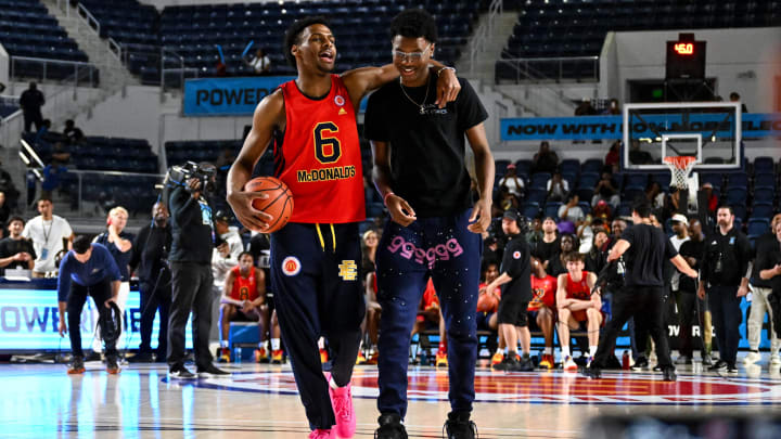 Mar 27, 2023; Houston, TX, USA;  McDonald's All American West guard Bronny James (6) and Bryce Maximus James (right) walk on the court during the Powerade Jam Fest at Delmar Athletic Complex. Mandatory Credit: Maria Lysaker-USA TODAY Sports