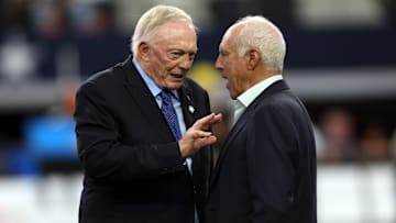 Dallas Cowboys owner Jerry Jones talks to Philadelphia Eagles owner Jeffrey Lurie before the game at AT&T Stadium.
