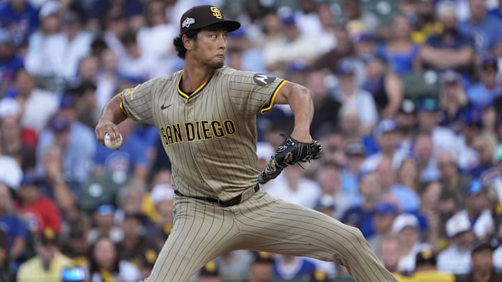Oct 2, 2025; Chicago, Illinois, USA; San Diego Padres starting pitcher Yu Darvish (11) throws during the first inning against the Chicago Cubs during game three of the Wildcard round for the 2025 MLB playoffs at Wrigley Field. Mandatory Credit: David Banks-Imagn Images