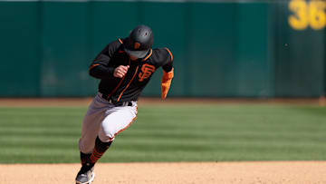 Mar 26, 2023; Oakland, California, USA;  San Francisco Giants right fielder Brett Auerbach (89) runs towards third base during the eighth inning against the Oakland Athletics at RingCentral Coliseum. Mandatory Credit: Stan Szeto-Imagn Images