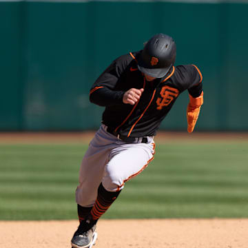 Mar 26, 2023; Oakland, California, USA;  San Francisco Giants right fielder Brett Auerbach (89) runs towards third base during the eighth inning against the Oakland Athletics at RingCentral Coliseum. Mandatory Credit: Stan Szeto-Imagn Images