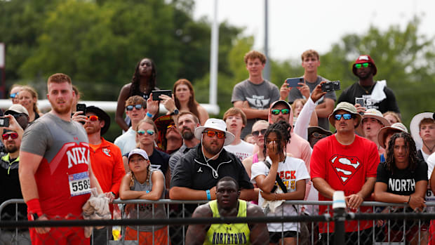 Hayden Mays watches Jackson Cantwell throw