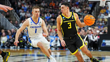 Mar 23, 2024; Pittsburgh, PA, USA; Oregon Ducks guard Jackson Shelstad (3) drives to the basket against Creighton Bluejays guard Steven Ashworth (1) during the first half in the second round of the 2024 NCAA Tournament at PPG Paints Arena. Mandatory Credit: Gregory Fisher-Imagn Images