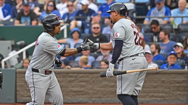 Jun 28, 2024; Kansas City, Missouri, USA;  Cleveland Guardians third baseman Jose Ramirez (left) celebrates with first baseman Josh Naylor (right) after hitting a solo home run in the first inning against the Kansas City Royals at Kauffman Stadium. Mandatory Credit: Peter Aiken-USA TODAY Sports