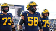 Michigan offensive lineman Giovanni El-Hadi (58) warms up ahead of the Washington game at Michigan Stadium in Ann Arbor on Saturday, Oct. 18, 2025.