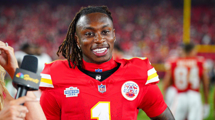 Sep 5, 2024; Kansas City, Missouri, USA; Kansas City Chiefs wide receiver Xavier Worthy (1) speaks with media after the win over the Baltimore Ravens at GEHA Field at Arrowhead Stadium. Mandatory Credit: Denny Medley-Imagn Images