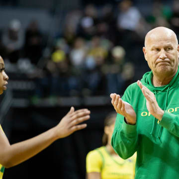 Oregon head coach Kelly Graves gathers his team for a timeout as the Oregon Ducks host the No. 4 Stanford Cardinal Saturday, March 2, 2024, at Matthew Knight Arena in Eugene, Ore.