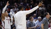 Mar 21, 2025; Cleveland, OH, USA; Alabama Crimson Tide guard Mark Sears (1) and forward Mouhamed Dioubate (10) reacts in the second half against the Robert Morris Colonials  during the NCAA Tournament First Round at Rocket Arena. 