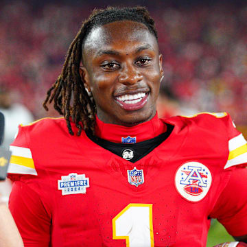 Sep 5, 2024; Kansas City, Missouri, USA; Kansas City Chiefs wide receiver Xavier Worthy (1) speaks with media after the win over the Baltimore Ravens at GEHA Field at Arrowhead Stadium. Mandatory Credit: Denny Medley-Imagn Images