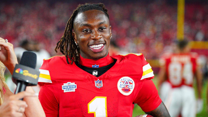 Sep 5, 2024; Kansas City, Missouri, USA; Kansas City Chiefs wide receiver Xavier Worthy (1) speaks with media after the win over the Baltimore Ravens at GEHA Field at Arrowhead Stadium. Mandatory Credit: Denny Medley-Imagn Images