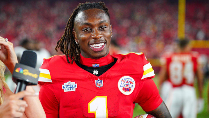 Sep 5, 2024; Kansas City, Missouri, USA; Kansas City Chiefs wide receiver Xavier Worthy (1) speaks with media after the win over the Baltimore Ravens at GEHA Field at Arrowhead Stadium. Mandatory Credit: Denny Medley-Imagn Images