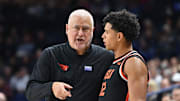 Jan 28, 2025; Spokane, Washington, USA; Oregon State Beavers head coach Wayne Tinkle talks with Oregon State Beavers forward Michael Rataj (12) during a game against the Gonzaga Bulldogs in the second half at McCarthey Athletic Center. Mandatory Credit: James Snook-Imagn Images