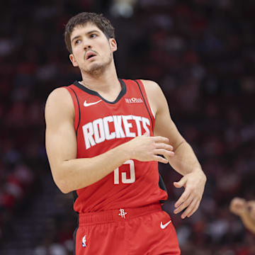 Feb 9, 2025; Houston, Texas, USA; Houston Rockets guard Reed Sheppard (15) reacts after a play during the game against the Toronto Raptors at Toyota Center. Mandatory Credit: Troy Taormina-Imagn Images