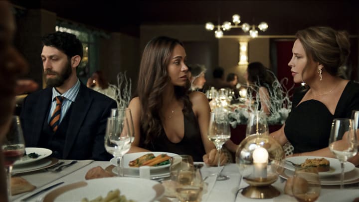 Emilia Pérez. (Featured L-R) Zoe Saldaña as Rita Moro Castro and Karla Sofía Gascón as Emilia Pérez in Emilia Pérez. Cr. Netflix © 2024.