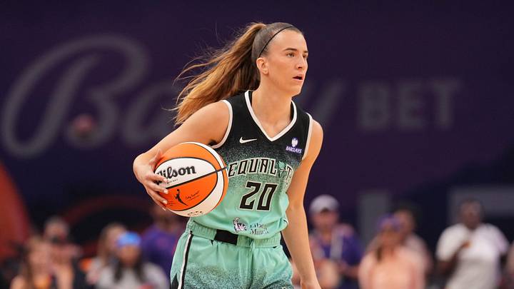 Sep 19, 2025; Phoenix, Arizona, USA; New York Liberty guard Sabrina Ionescu (20) dribbles against the Phoenix Mercury during the first half of game three of round one for the 2025 WNBA Playoffs at PHX Arena. Mandatory Credit: Joe Camporeale-Imagn Images