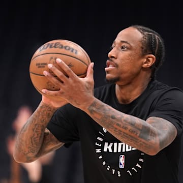 Mar 25, 2025; Sacramento, California, USA; Sacramento Kings guard DeMar DeRozan (10) warms up before the start of the game against the Oklahoma City Thunder at the Golden 1 Center. Mandatory Credit: Cary Edmondson-Imagn Images