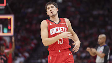 Feb 9, 2025; Houston, Texas, USA; Houston Rockets guard Reed Sheppard (15) reacts after a play during the game against the Toronto Raptors at Toyota Center. Mandatory Credit: Troy Taormina-Imagn Images