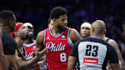 Jan 10, 2025; Philadelphia, Pennsylvania, USA; Philadelphia 76ers forward Paul George (8) has words with referee Tre Maddox (23) after a stoppage of play during the third quarter against the New Orleans Pelicans at Wells Fargo Center. Mandatory Credit: Bill Streicher-Imagn Images
