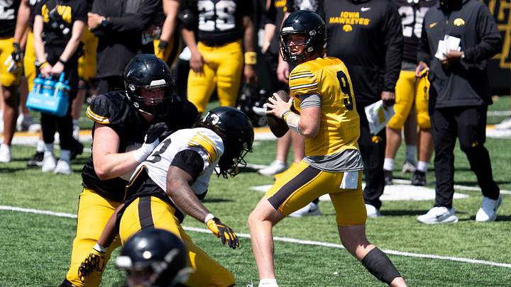 Iowa quarterback Hank Brown (9) looks to pass the football April 25, 2026 during the team’s spring practice at Kinnick Stadium in Iowa City, Iowa.