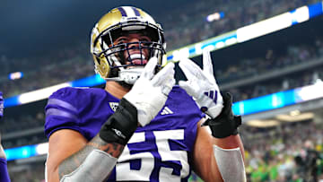 Dec 1, 2023; Las Vegas, NV, USA; Washington Huskies offensive lineman Troy Fautanu (55) celebrates