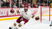 Apr 11, 2024; Saint Paul, Minnesota, USA; Boston College Eagles forward Cutter Gauthier (19) celebrates his goal in the semifinals of the 2024 Frozen Four college ice hockey tournament during the second period against the Michigan Wolverines at Xcel Energy Center. Mandatory Credit: Brace Hemmelgarn-Imagn Images