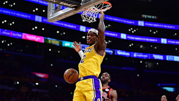 Jan 25, 2024; Los Angeles, California, USA; Los Angeles Lakers forward Jarred Vanderbilt (2) dunks for the basket against the Los Angeles Lakers during the first half at Crypto.com Arena. Mandatory Credit: Gary A. Vasquez-Imagn Images