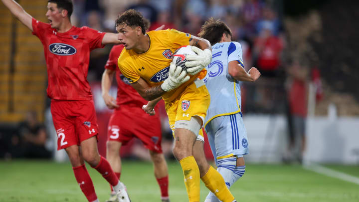 Jul 9, 2024; Kennesaw, Georgia, USA; Indy Eleven goalkeeper Hunter Sulte (0) makes a save against the Atlanta United in the second half at Fifth Third Bank Stadium. Mandatory Credit: Brett Davis-USA TODAY Sports