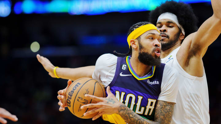 Feb 10, 2023; New Orleans, Louisiana, USA; New Orleans Pelicans forward Brandon Ingram (14) fights for position against Cleveland Cavaliers center Jarrett Allen (31) during the third quarter at Smoothie King Center. Mandatory Credit: Andrew Wevers-USA TODAY Sports