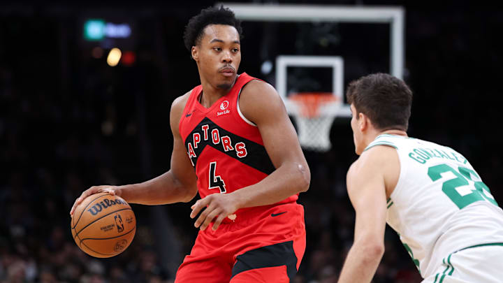 Oct 15, 2025; Boston, Massachusetts, USA; Toronto Raptors guard Scottie Barnes (4) dribbles down the court during the second half against the Boston Celtics at TD Garden. Mandatory Credit: Paul Rutherford-Imagn Images