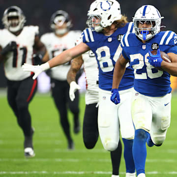 [US, Mexico & Canada customers only] Nov 9, 2025; Berlin, GERMANY; Indianapolis Colts running back Jonathan Taylor (28) scores a touchdown against the Atlanta Falcons during the Berlin Game at Olympic Stadium. Mandatory Credit: Lisi Niesner/Reuters via Imagn Images