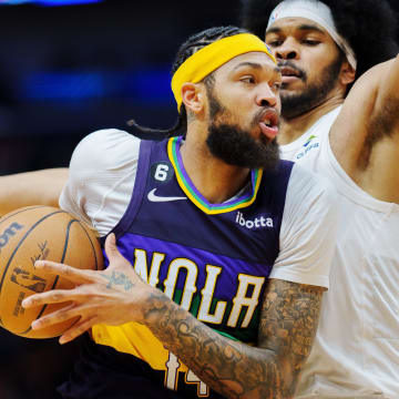 Feb 10, 2023; New Orleans, Louisiana, USA; New Orleans Pelicans forward Brandon Ingram (14) fights for position against Cleveland Cavaliers center Jarrett Allen (31) during the third quarter at Smoothie King Center. Mandatory Credit: Andrew Wevers-USA TODAY Sports