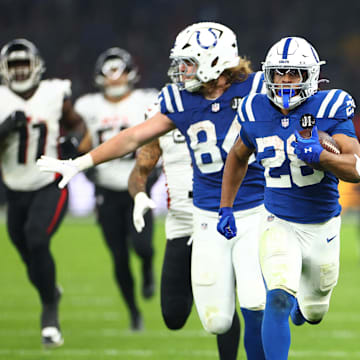 Nov 9, 2025; Berlin, GERMANY; Indianapolis Colts running back Jonathan Taylor (28) scores a touchdown against the Atlanta Falcons during the Berlin Game at Olympic Stadium. 