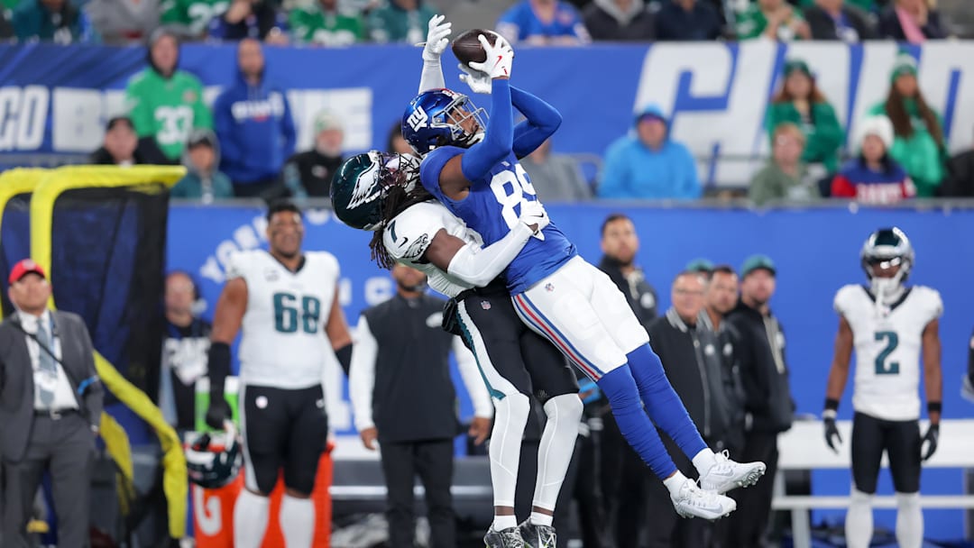 Oct 9, 2025; East Rutherford, New Jersey, USA; New York Giants wide receiver Lil'Jordan Humphrey (89) makes a reception defended by Philadelphia Eagles cornerback Kelee Ringo (7) during the first quarter of the game at MetLife Stadium. Mandatory Credit: Brad Penner-Imagn Images