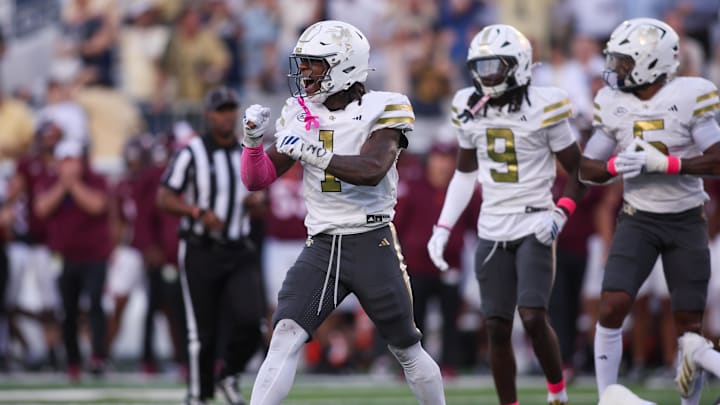 Oct 11, 2025; Atlanta, Georgia, USA; Georgia Tech Yellow Jackets linebacker Cayman Spaulding (1) reacts after a turnover on downs against the Virginia Tech Hokies in the fourth quarter at Bobby Dodd Stadium at Hyundai Field. Mandatory Credit: Brett Davis-Imagn Images