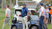 Apr 3, 2025; Miami, Florida, USA; Florida Gov. Ron DeSantis looks on before playing this shot from the ninth tee during the Pro-Am round of the LIV Golf Miami golf tournament at Trump National Doral. Mandatory Credit: Sam Navarro-Imagn Images