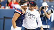 Nov 8, 2025; Tucson, Arizona, USA; Arizona Wildcats quarterback Noah Fifita (1) celebrates with offensive coordinator Seth Doege after defeating the Kansas Jayhawks at Arizona Stadium. Mandatory Credit: Mark J. Rebilas-Imagn Images