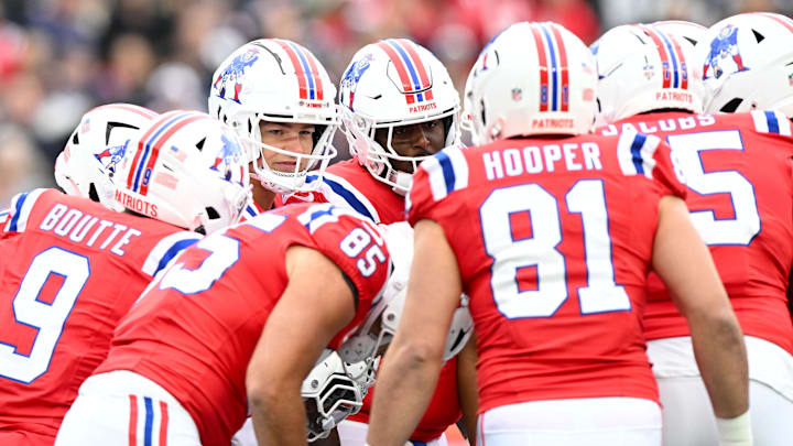 Oct 13, 2024; Foxborough, Massachusetts, USA; New England Patriots quarterback Drake Maye (10) huddles with his teammates  during the first half of a game against the Houston Texans at Gillette Stadium. Mandatory Credit: Brian Fluharty-Imagn Images