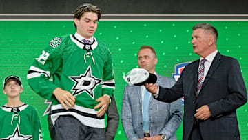 Jul 7, 2022; Montreal, Quebec, CANADA; Lian Bichsel after being selected as the number eighteen overall pick to the Dallas Stars in the first round of the 2022 NHL Draft at Bell Centre. Mandatory Credit: Eric Bolte-Imagn Images