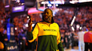 Golden State Warriors forward Draymond Green blows a kiss towards the crowd.
