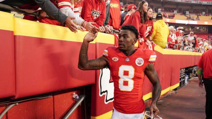 Oct 12, 2023; Kansas City, Missouri, USA; Kansas City Chiefs wide receiver Justyn Ross (8) celebrates with fans while leaving the game after the win over the Los Angeles Chargers at GEHA Field at Arrowhead Stadium. Mandatory Credit: Denny Medley-USA TODAY Sports