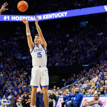 Feb 24, 2024; Lexington, Kentucky, USA; Kentucky Wildcats guard Reed Sheppard (15) makes a three point basket during the second half against the Alabama Crimson Tide at Rupp Arena at Central Bank Center. Mandatory Credit: Jordan Prather-USA TODAY Sports