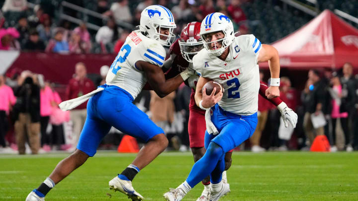 Oct 20, 2023; Philadelphia, Pennsylvania, USA; SMU Mustangs quarterback Preston Stone (2) runs with the ball against the Temple Owls during the first half at Lincoln Financial Field. Mandatory Credit: Gregory Fisher-USA TODAY Sports