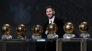 Acá tenés tu foto de portada: Messi y su balones de oro.