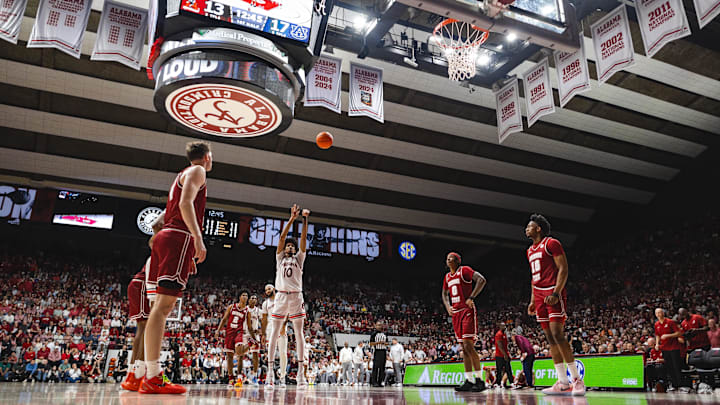 Feb 15, 2025; Tuscaloosa, Alabama, USA; Auburn Tigers guard Chad Baker-Mazara (10) attempts a free throw against the Alabama Crimson Tide during the first half at Coleman Coliseum. Mandatory Credit: Will McLelland-Imagn Images