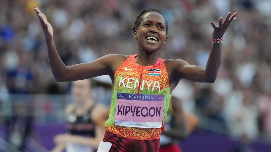 Faith Kipyegon (KEN) celebrates. | Kirby Lee-Imagn Images