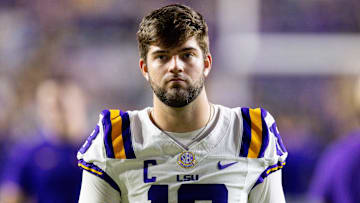 Nov 22, 2025; Baton Rouge, Louisiana, USA;  LSU Tigers quarterback Garrett Nussmeier (18) looks on against the Western Kentucky Hilltoppers  during the pre-game at Tiger Stadium. Mandatory Credit: Stephen Lew-Imagn Images