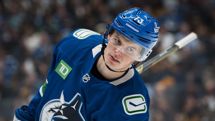 Nov 5, 2025; Vancouver, British Columbia, CAN; Vancouver Canucks forward Lukas Reichel (73) during a stop in play against the Chicago Blackhawks in the second period at Rogers Arena. Mandatory Credit: Bob Frid-Imagn Images